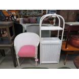 Lloyd Loom style chair and a similar white bamboo storage cupboard