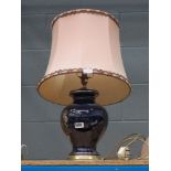 Bird patterned blue glazed table lamp with pink shade