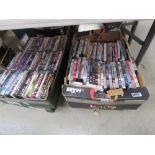 4 boxes containing DVDs