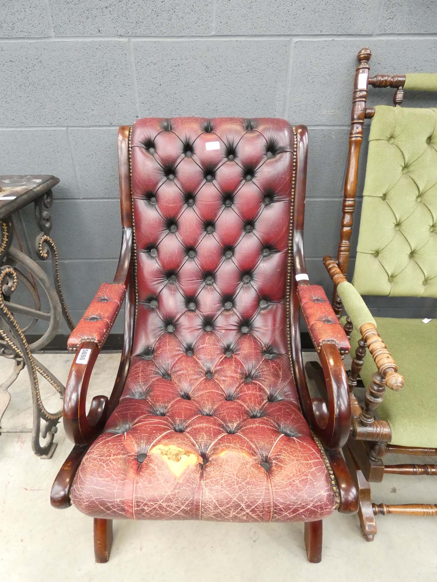 Burgundy and button upholstered fireside armchair