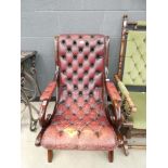Burgundy and button upholstered fireside armchair