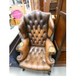 Button upholstered wingback armchair