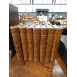 Set of 7 children's encyclopedia in brown leather bindings