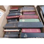 Box containing Bibles and hymn books