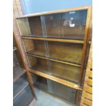 Bookcase with glazed sliding doors in 4 sections