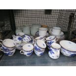 Cage containing quantity of blue and white dragon patterned crockery, kitchen storage vessels