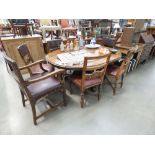 5207 Set of 7 carved oak dining chairs with embossed leather backs (6+1)