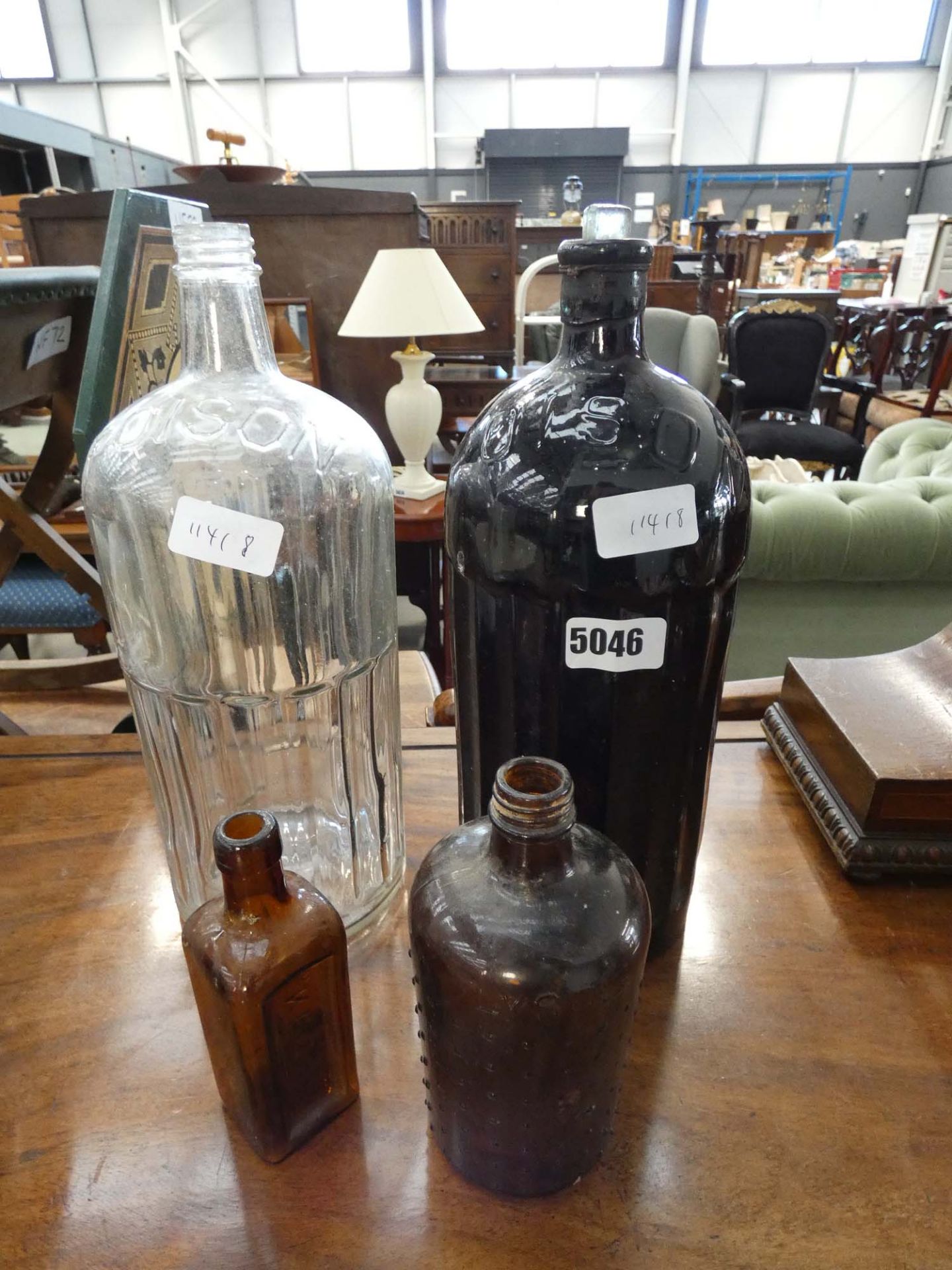 2 poison bottles and 2 other glass bottles