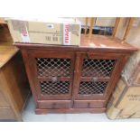 Jali cabinet with lattice work panels