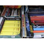 2 boxes containing Wisden anthologies, Rock and Roll colelctibles, cookery books, various