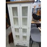 White glazed display cabinet with a single drawer