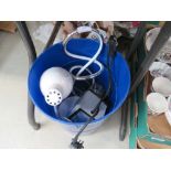 Blue waste paper basket with table lamps