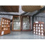 Cage containing quantity of thimbles and display cabinets