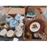 3 boxes containing comemmorative mugs, water jugs, brassware, and glassware