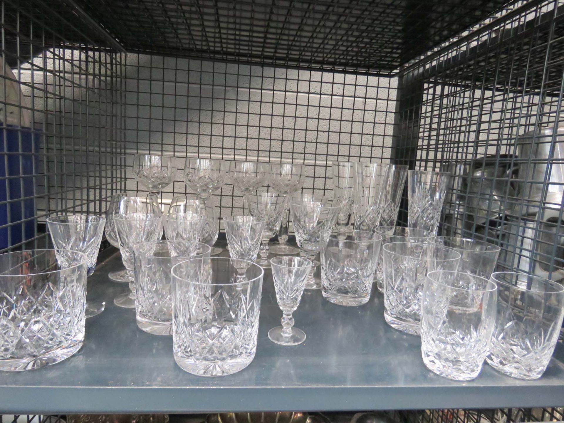 Cage containing quantity of tumblers, sherry and wine glasses