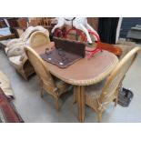 Bentwood and wicker conservatory table with 4 chairs and pair of armchairs