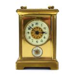 A 19th century carriage clock, the movement striking on a bell,