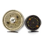 Two fresh water centre pin reels including 'The Maxima Reel' and 'Speedia Fishing Tackle Products'