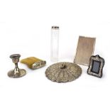 A mixed parcel of silver and metalware comprising a dressing table bottle, a dwarf candlestick,