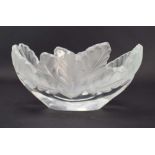 A Lalique frosted and clear glass bowl the rim decorated with stylised leaves, base etched 'Lalique,