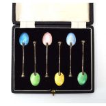 A set of six mid-20th century silver and guilloché enamelled seal end coffee spoons,