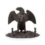 A silver plated cast metal desk stand modelled as a standing eagle, h.