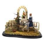 A Country Artists figural group modelled by Richard Sefton, depicing a knight and his sweetheart,
