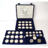 A set of thirty-six Westminster American silver coins including a Morgan dollar,