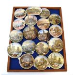Eighteen pot lids including a view of Alexandra Palace, 'Transplanting Rice' and others, max d. 11.