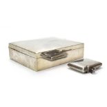An early 20th century silver cigarette box of rectangular form, maker HM, Birmingham 1911, w.