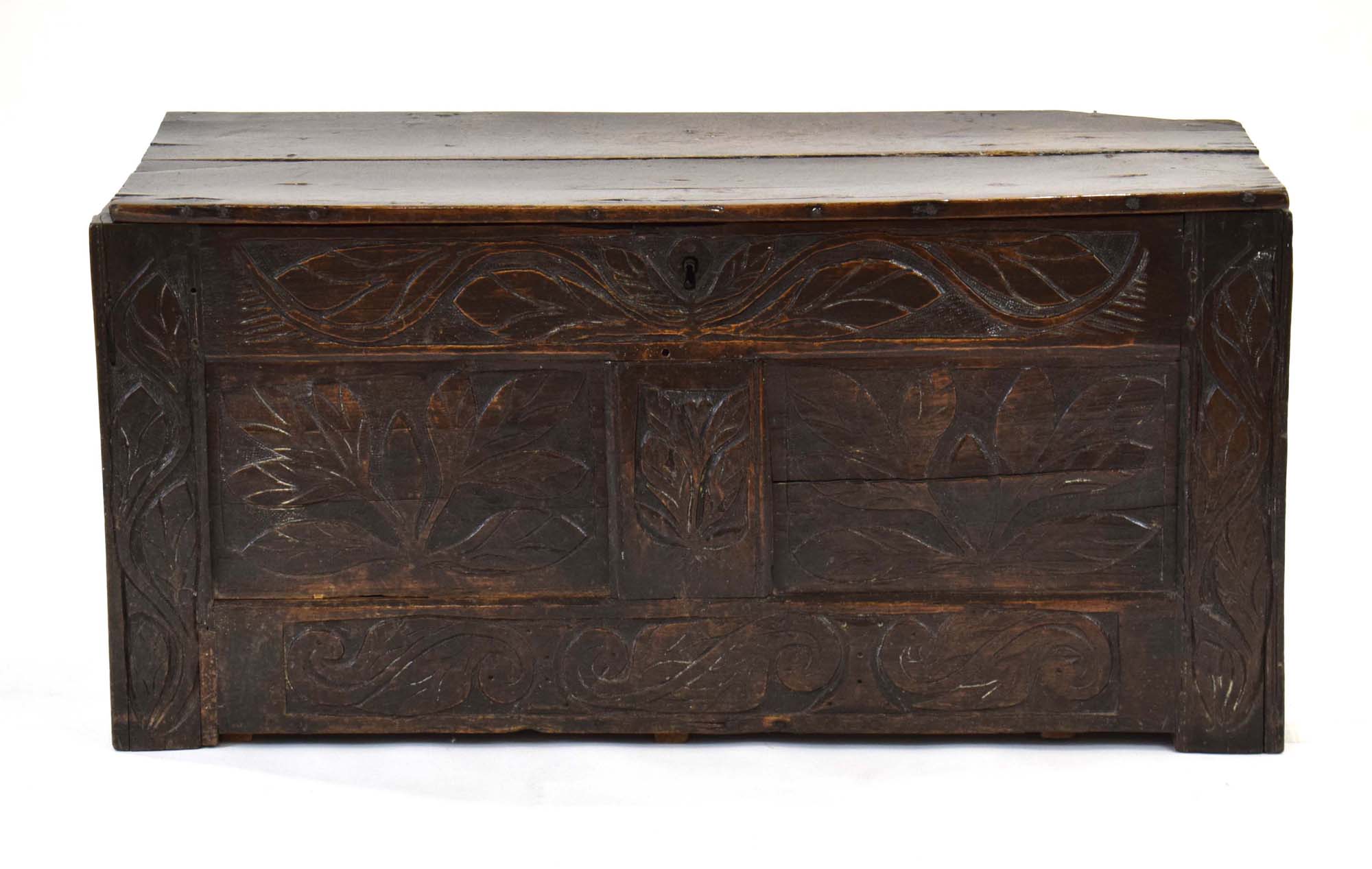 A late 17th/early 18th century oak coffer, the florally carved front with two panels, - Image 2 of 4