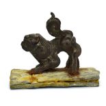 A Chinese brown patinated bronze figure modelled as a foo dog, h. 6.