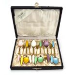 A set of six Danish silver gilt and guilloché enamelled pickle forks and spoons,