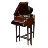 A 1920's Gilbert of Sheffield gramophone housed in a mahogany cabinet modelled as a baby grand