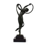 After Pierre Le Faguays (1892-1962), a green patinated figure modelled as an Art Deco dancer,