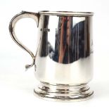 An early 20th century silver Christening mug/small tankard, maker HA, Sheffield 1928, h.