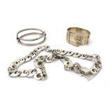 A silver hinged buckle bracelet, import marks, w.