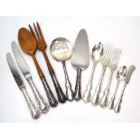 A suite of Continental silver flatware in the rococo manner comprising: a pair of salad servers,