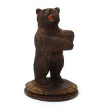 A Black Forest type polychrome figure modelled as a bear, h.