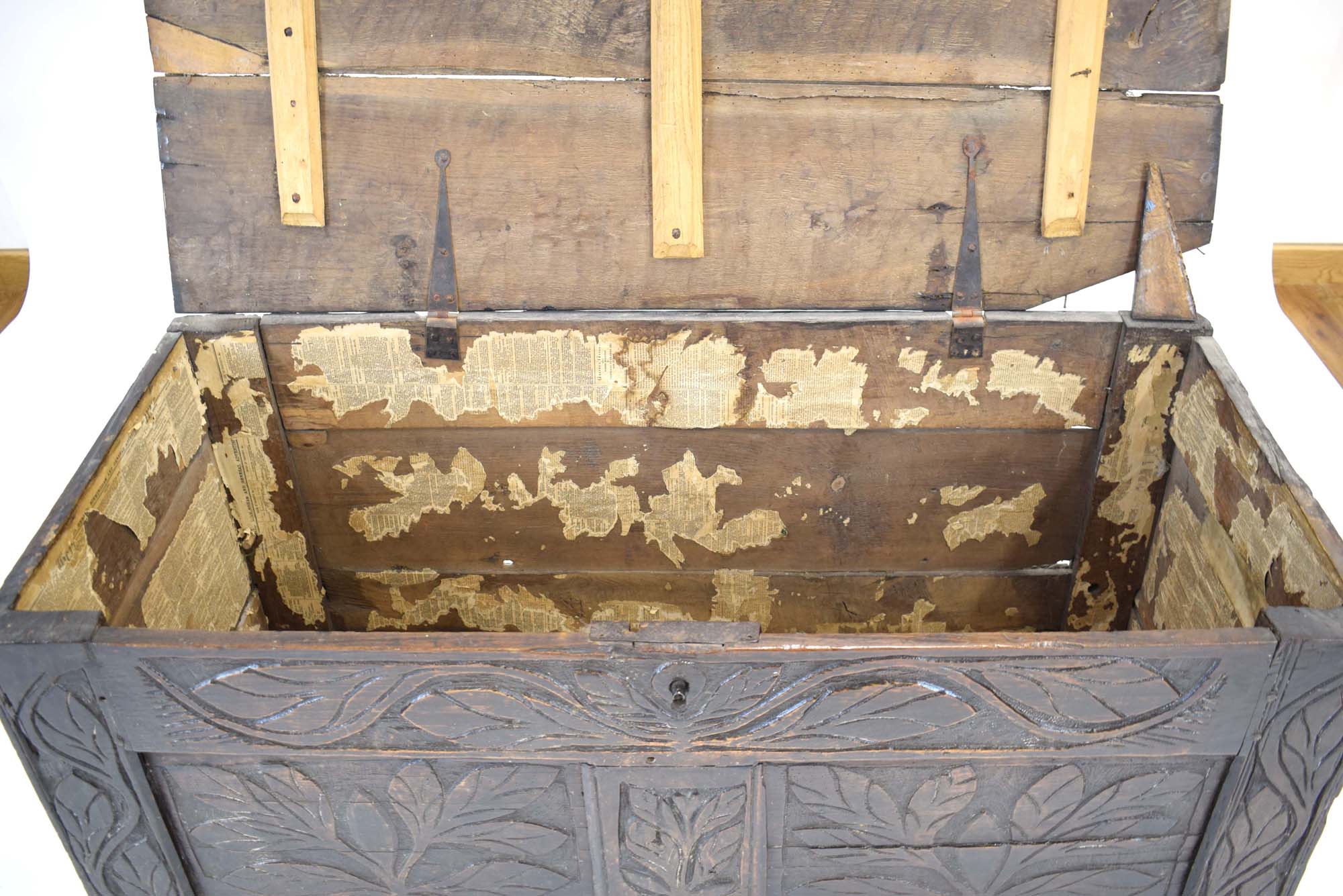 A late 17th/early 18th century oak coffer, the florally carved front with two panels, - Image 4 of 4