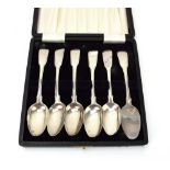 A set of six George III silver fiddle and thread pattern teaspoons, maker WE, London 1805, 3.