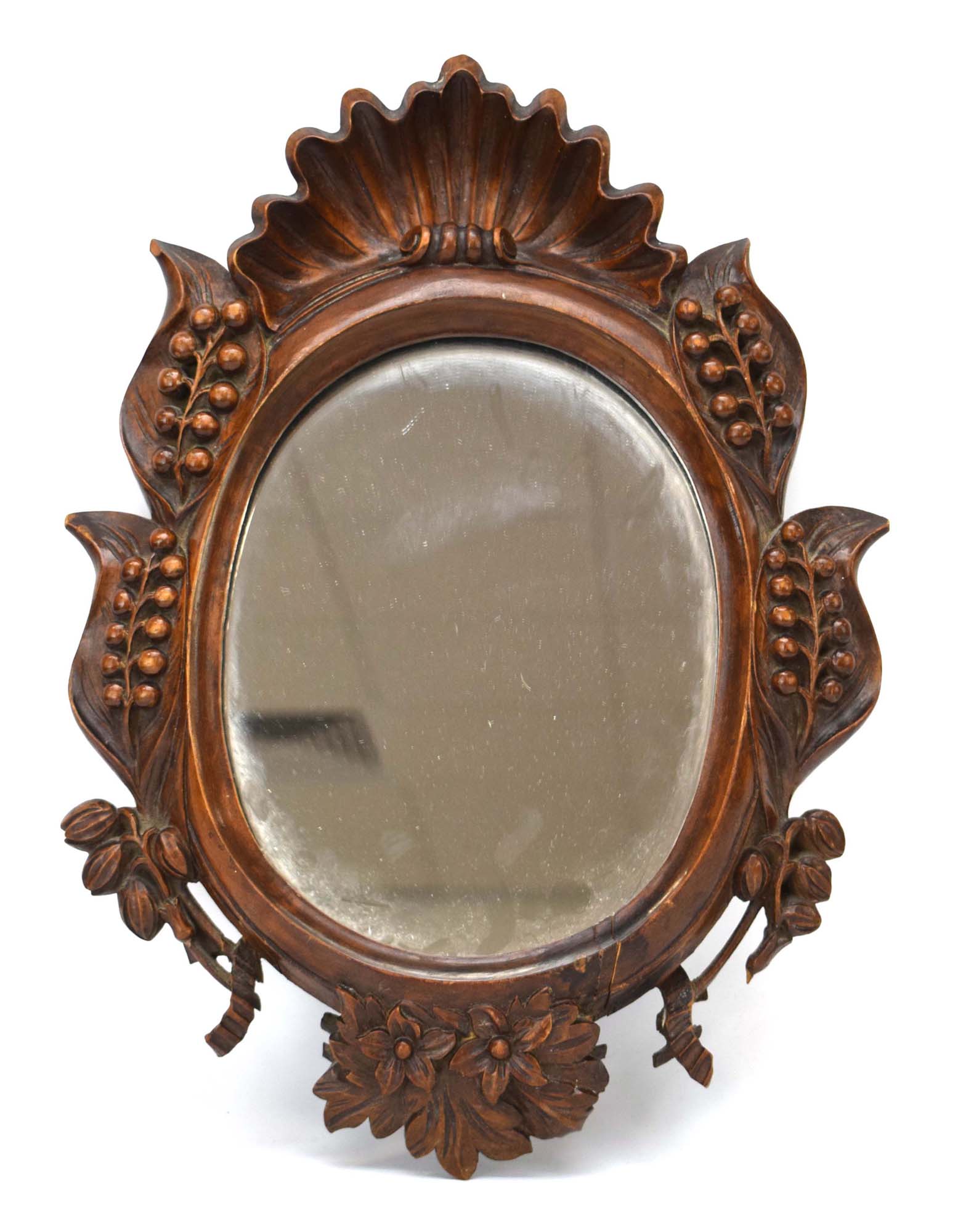 A Continental carved wall mirror,