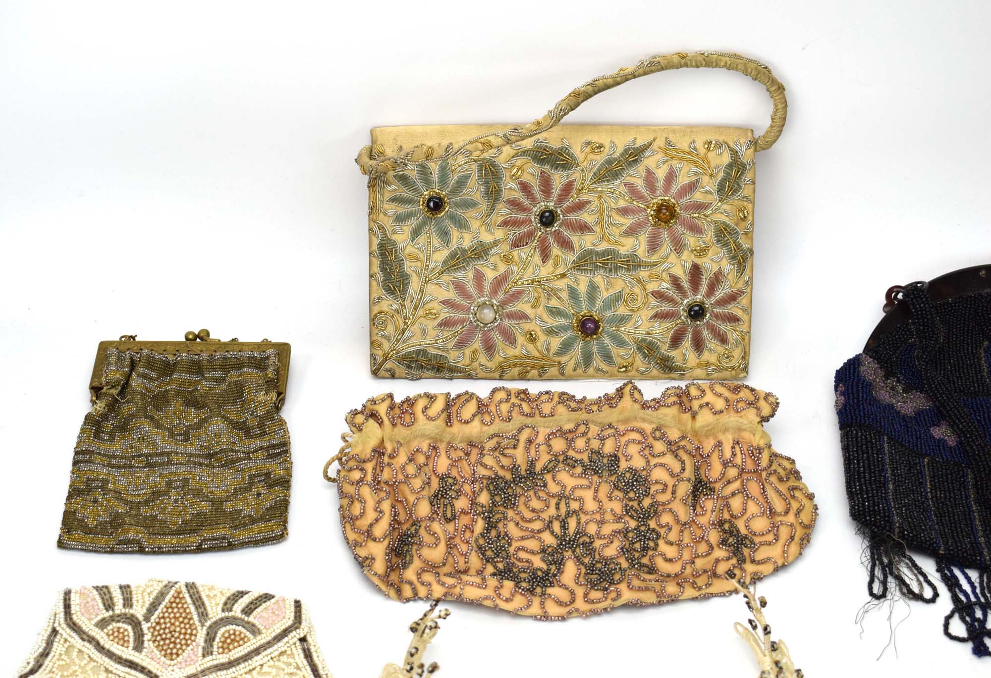 A group of textiles including an embroidered clutch bag with glass roundels, - Image 2 of 14