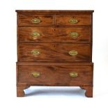 A 19th century mahogany and crossbanded chest-on-chest of low proportions,