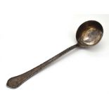 A Continental metalware ladle of typical form with beaded border and diamond shaped decoration, l.