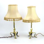 A pair of early 20th century Arts & Crafts brass 'Pullman' lamps, stamped F&S, h. 29 cm (excl.