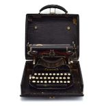 A cased folding Corona typewriter, c.