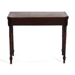 A 19th century mahogany, strung and crossbanded fold-over games table on slender turned legs, w.