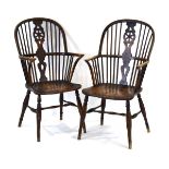 A pair of late 18th/early 19th century elm seated wheelback Windsor armchairs CONDITION