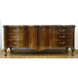 A German walnut serpentine sideboard,